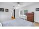 Well-lit bedroom with light wood flooring, natural light, and closet access at 750 49Th N Ave, St Petersburg, FL 33703