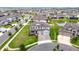 A high angle view of a home in a community with pond at 7628 Surf Reed Way, Wesley Chapel, FL 33545