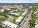 Sprawling community showcasing well-manicured lawns, mature trees, and a community pool at 801 Russell Ln # 252, Brandon, FL 33510