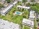 Aerial view of community, showing the sparkling pool, and green spaces at 801 Russell Ln # 252, Brandon, FL 33510