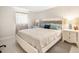 Bright bedroom with a neutral palette and stylish furnishings, creating a serene and comfortable retreat at 801 Russell Ln # 252, Brandon, FL 33510