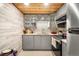 Modern kitchen with stainless steel appliances, ample counter space, and stylish cabinetry at 801 Russell Ln # 252, Brandon, FL 33510