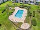 Sparkling pool with lounge chairs, surrounded by lush landscaping, perfect for relaxing at 801 Russell Ln # 252, Brandon, FL 33510
