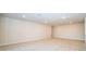 Large bonus room with recessed lighting and neutral carpet; perfect for a playroom or media room at 8834 Sanders Tree Loop, Wesley Chapel, FL 33545
