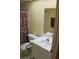 Cozy bathroom featuring a vanity, mirror, toilet, shower with curtain, and accessible grab bars at 9722 Indian Key Trl # 116, Seminole, FL 33776
