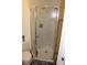Bathroom showing a glass-enclosed shower at 9722 Indian Key Trl # 116, Seminole, FL 33776