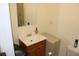 Bathroom featuring a vanity and medicine cabinet in a well-lit space at 9722 Indian Key Trl # 116, Seminole, FL 33776