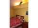 Comfortable bedroom with charming decor and plenty of natural light at 9722 Indian Key Trl # 116, Seminole, FL 33776