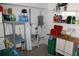 A garage with shelving, workspace, and storage solutions at 9722 Indian Key Trl # 116, Seminole, FL 33776