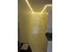 Bright hallway features overhead LED lighting and marble-style tile flooring at 9722 Indian Key Trl # 116, Seminole, FL 33776