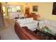 Inviting living area with neutral walls, a blend of cozy seating options, and an open layout with dining space at 9722 Indian Key Trl # 116, Seminole, FL 33776