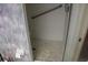 Walk-in shower features an easy-to-clean tile floor at 9722 Indian Key Trl # 116, Seminole, FL 33776