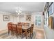 Dining room with a large window for lots of natural light at 10513 Carrollview Dr, Tampa, FL 33618