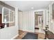 Hallway with tile flooring leading to the other rooms of the house at 10513 Carrollview Dr, Tampa, FL 33618