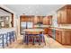 Well-equipped kitchen with a granite island and countertops, stainless steel appliances, and ample cabinets at 10513 Carrollview Dr, Tampa, FL 33618