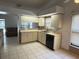Functional kitchen offering ample counter space and a seamless flow into the adjacent living area at 10811 Candlin Ct, Riverview, FL 33578