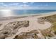 Breathtaking aerial view of the pristine beach and glistening ocean at a beachfront community at 1270 Gulf Blvd # 1901, Clearwater Beach, FL 33767