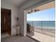 Waterfront views from balcony with ceiling fan and seating, next to bathroom at 1270 Gulf Blvd # 1901, Clearwater Beach, FL 33767