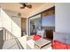 Waterfront balcony with lounge seating, closet, and sliding glass door access to bedroom at 1270 Gulf Blvd # 1901, Clearwater Beach, FL 33767