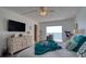 Bedroom with sliding glass doors leading to balcony and waterfront views at 1270 Gulf Blvd # 1901, Clearwater Beach, FL 33767
