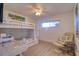 Cozy bedroom with built-in bunk beds, desk area, and bright natural light at 1270 Gulf Blvd # 1901, Clearwater Beach, FL 33767