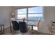 Dining area boasting a glass table and ocean views, creating a serene dining experience at 1270 Gulf Blvd # 1901, Clearwater Beach, FL 33767