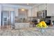 Updated kitchen featuring granite countertops, stainless steel appliances, and natural light at 1270 Gulf Blvd # 1901, Clearwater Beach, FL 33767