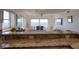 Open kitchen view with granite countertops overlooking living area and ocean view at 1270 Gulf Blvd # 1901, Clearwater Beach, FL 33767