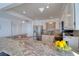 Open concept kitchen with granite countertops, stainless steel appliances, and ample cabinet space at 1270 Gulf Blvd # 1901, Clearwater Beach, FL 33767