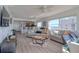 Bright, open-concept living area with serene bay views and modern, stylish decor at 1270 Gulf Blvd # 1901, Clearwater Beach, FL 33767