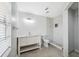 Updated bathroom with marble countertops, shiplap accent wall, and tiled shower at 1555 Newhope Rd, Spring Hill, FL 34606