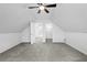 Bright bedroom showcasing carpet, neutral walls, and doorways to other rooms and closets at 1562 Oakhurst Dr, Brooksville, FL 34601