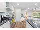 Kitchen featuring stainless steel appliances and granite countertops at 1562 Oakhurst Dr, Brooksville, FL 34601