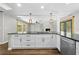 Kitchen island with granite countertops and stainless steel appliances at 1562 Oakhurst Dr, Brooksville, FL 34601