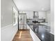 The kitchen boasts modern appliances and granite countertops at 1562 Oakhurst Dr, Brooksville, FL 34601