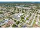A high-angle perspective of a neighborhood highlighting various homes, streets, and communal structures at 1701 38Th N St, St Petersburg, FL 33713