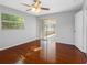 Bedroom with hardwood floors, a sunroom, natural light, and neutral walls at 1701 38Th N St, St Petersburg, FL 33713