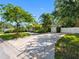 Front exterior view of a single-Gathering home featuring a well-manicured lawn and circular driveway at 1701 38Th N St, St Petersburg, FL 33713