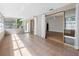 Bright sunroom with tile floors, large windows, and sliding doors to the spacious interior at 1701 38Th N St, St Petersburg, FL 33713