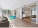 Bright sunroom, with yoga mats, and sliding doors leading to other living spaces at 1701 38Th N St, St Petersburg, FL 33713