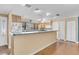 Bright kitchen boasts ample counter space, wood cabinetry, and modern appliances at 1739 Woodridge Dr, Clearwater, FL 33756