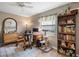 Inviting bedroom features a desk and closet for a comfortable and organized space at 1762 Atrium Dr, Sun City Center, FL 33573