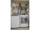 Convenient laundry room with modern washer and dryer units at 1762 Atrium Dr, Sun City Center, FL 33573