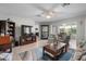 Spacious living room with an open floor plan and comfortable seating area at 1762 Atrium Dr, Sun City Center, FL 33573