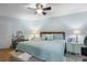 Comfortable main bedroom featuring a ceiling fan, and soft decor at 1762 Atrium Dr, Sun City Center, FL 33573