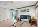 Bright bedroom with sliding glass doors and ample closet space at 1802 Bedford Ln # 7, Sun City Center, FL 33573
