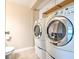 Laundry room with washer and dryer at 1877 Pine Cone Cir, Clearwater, FL 33760