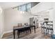 Eat-in kitchen features stainless steel appliances, white cabinetry, and dining area with wooded views at 22004 Dupree Dr, Land O Lakes, FL 34639