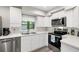 Bright and modern kitchen with stainless steel appliances and ample counter space at 22004 Dupree Dr, Land O Lakes, FL 34639