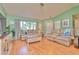 Inviting living room with ample natural light and comfortable seating arrangement at 2285 Hidden Meadows E Dr, Palm Harbor, FL 34683